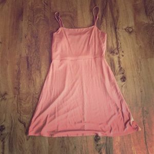 this dress is a peach color and is size medium